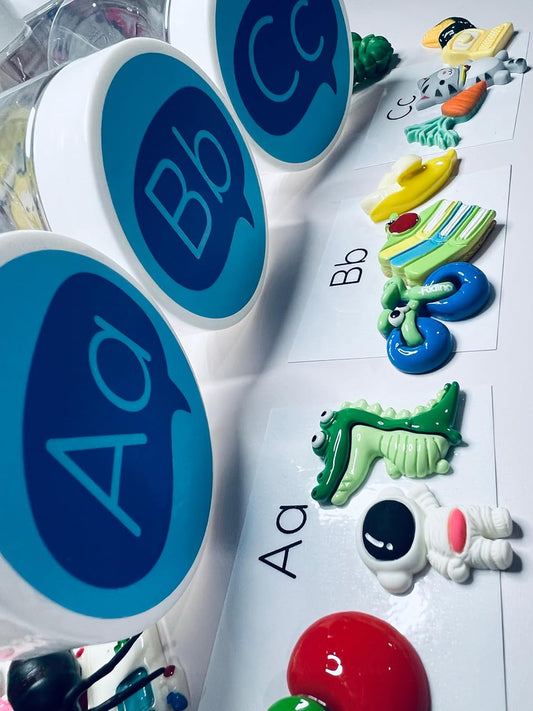 Alphabet Set in 26 Labeled Jars, Montessori Learning Materials for Preschool and Kindergarten, 7 Objects per Letter with Alphabet Mats