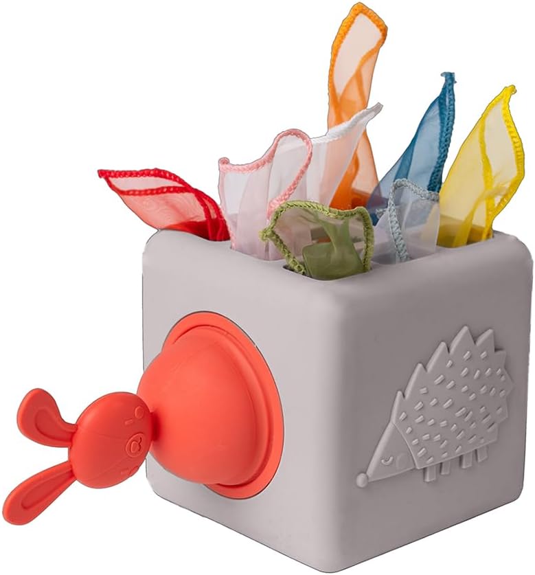 Taf Toys Baby Tissue Box Toy Silicone Baby Toys 6-12 Months Montessori Toys Sensory Activity & 10 Tissues for Fine Motor Development Soft Interactive Silicone Learning Cube for 1 Year Old Toddlers