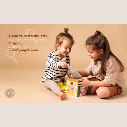 Taf Toys Baby Tissue Box Toy Silicone Baby Toys 6-12 Months Montessori Toys Sensory Activity & 10 Tissues for Fine Motor Development Soft Interactive Silicone Learning Cube for 1 Year Old Toddlers