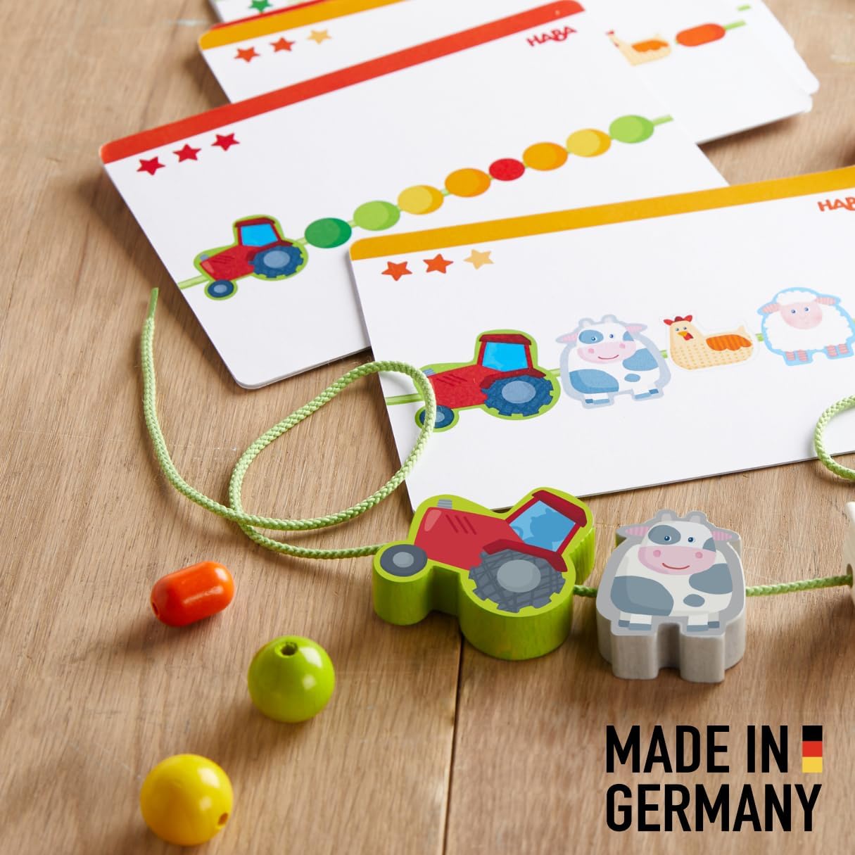 HABA Threading Game Farm Friends - Creative Educational Game & Threading Chain with 21 Wooden Beads & 2 Cords Including Template Cards - Threading Fun for Children from 3 Years - 1305780001
