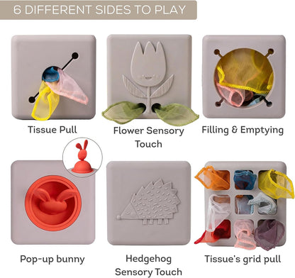 Taf Toys Baby Tissue Box Toy Silicone Baby Toys 6-12 Months Montessori Toys Sensory Activity & 10 Tissues for Fine Motor Development Soft Interactive Silicone Learning Cube for 1 Year Old Toddlers