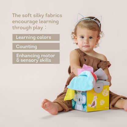 Taf Toys Baby Tissue Box Toy Silicone Baby Toys 6-12 Months Montessori Toys Sensory Activity & 10 Tissues for Fine Motor Development Soft Interactive Silicone Learning Cube for 1 Year Old Toddlers