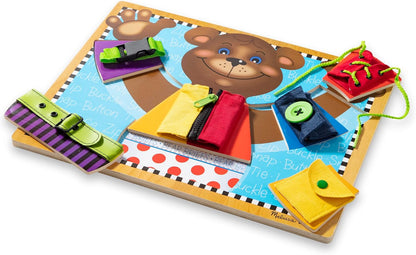 Melissa & Doug Basic Skills Puzzle Board - Wooden Educational Toy Learn to Button Busy Board, Activity for Fine Motor Skills, Developmental Toy for Toddlers Ages 3+
