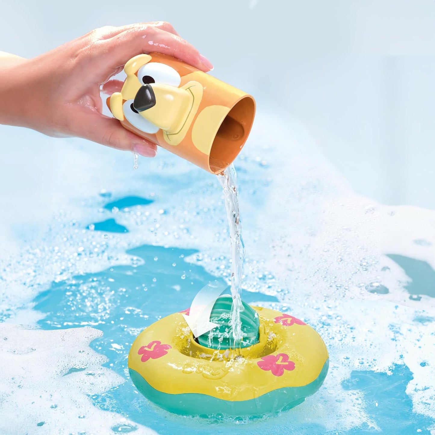 TOMY Toomies Bluey Bath Toys - Bluey's Family Pourers - Includes Chilli, Bandit, Bingo and Bluey Figures - Nesting and Stacking Cups for Bath, Beach or Pool - 4 Count - Ages 18 Months and Up