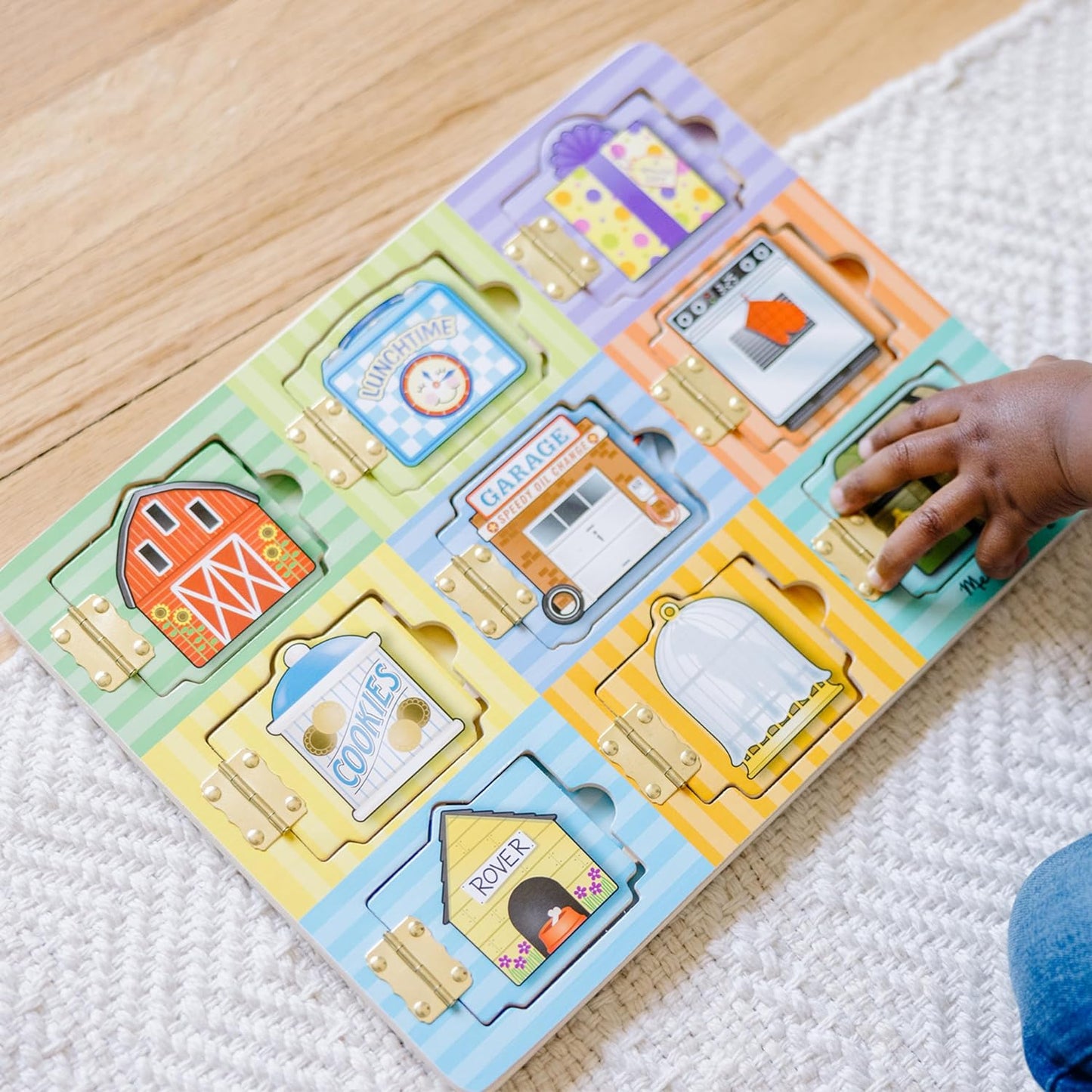 Melissa & Doug Wooden Hide & Seek Activity Board – Montessori Busy Board with Hinges, Doors & 9 Wooden Magnetic Puzzles, Educational Preschool Learning Toy for Toddlers & Kids Ages 3+