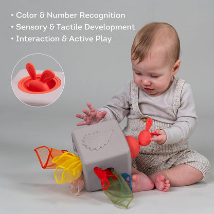 Taf Toys Baby Tissue Box Toy Silicone Baby Toys 6-12 Months Montessori Toys Sensory Activity & 10 Tissues for Fine Motor Development Soft Interactive Silicone Learning Cube for 1 Year Old Toddlers