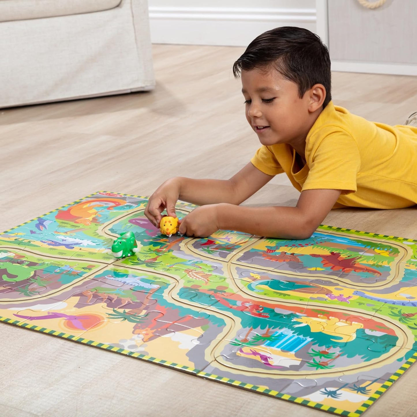 Melissa & Doug Dinosaur Adventure Tracks Cardboard Jigsaw Floor Puzzle and 2 Wind-Up Dinos – 48 Pieces, for Boys and Girls 3+