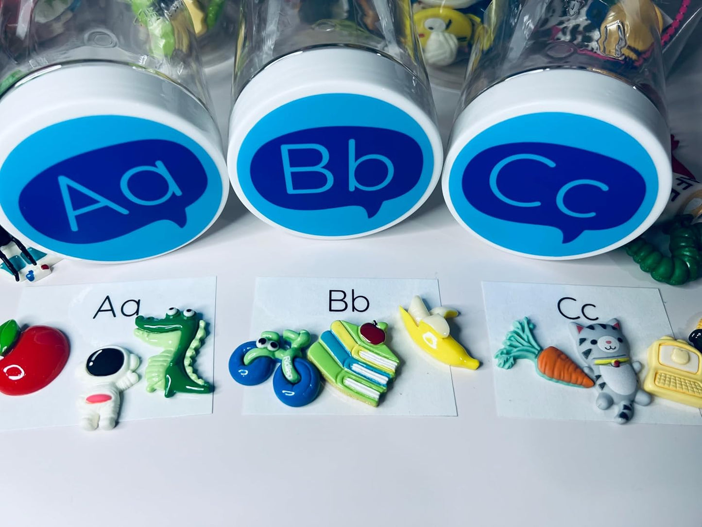 Alphabet Set in 26 Labeled Jars, Montessori Learning Materials for Preschool and Kindergarten, 7 Objects per Letter with Alphabet Mats