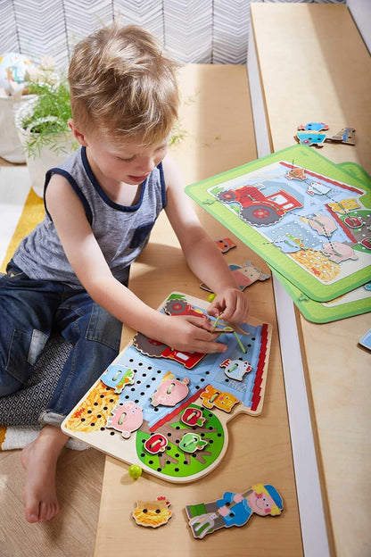 HABA Farm Threading Game with 18 Barn Yard Themed Wooden Tiles and Template Cards