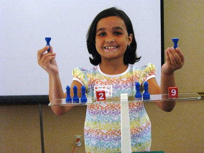 Hands-On Equations® Class Set for Teacher and 10 Students. Includes The Teacher Demonstration Balance Scale and Game Pieces and 10 Sets of Student Manipulatives. Grade 3 and up.
