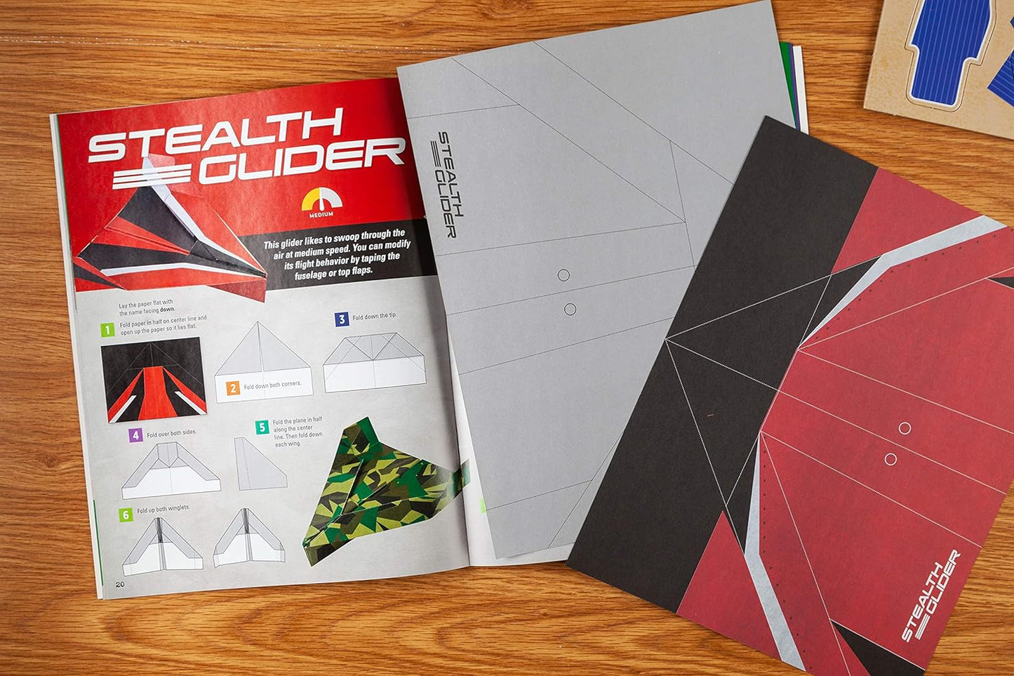 Paper Airplane Kit: 100 Planes to Fold & Fly, 1000 Stickers, Launcher & 100 Rubber Bands | Colorful Sheets | STEM Family Gift for Ages 7 and Up