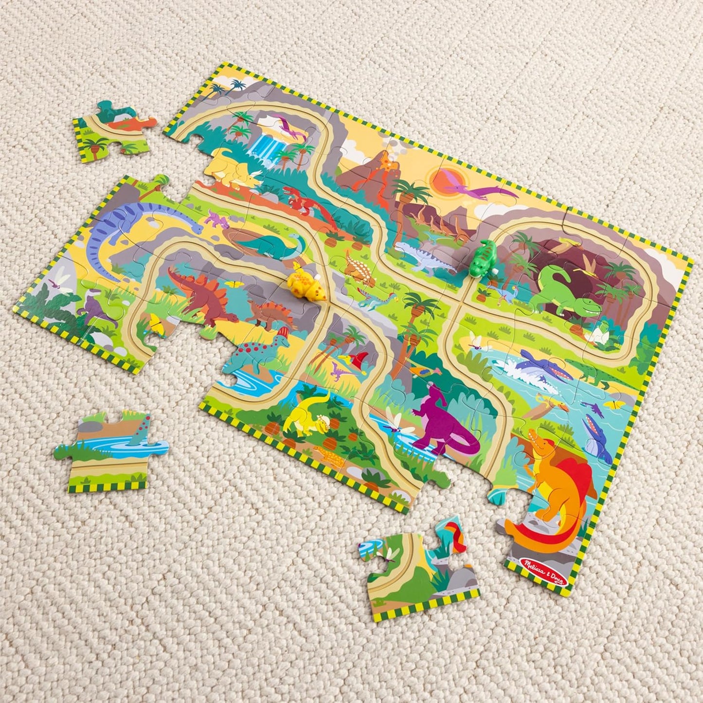 Melissa & Doug Dinosaur Adventure Tracks Cardboard Jigsaw Floor Puzzle and 2 Wind-Up Dinos – 48 Pieces, for Boys and Girls 3+