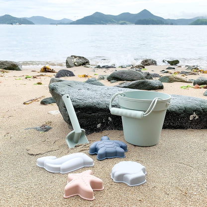 BLUE GINKGO Silicone Beach Toys - Modern Baby | Travel Friendly Toys Set | Silicone Bucket, Shovel, 4 Sand Molds, Beach Bag | Sand Toys for Toddlers, Kids - Yellow