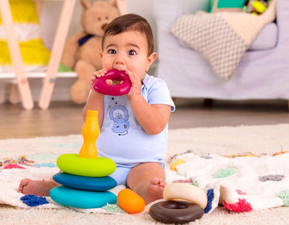 Skipping Stones, Textured Baby Ring Stacker | 7-piece baby sort-and-stack toy with 5 textured rings, base, and topper for sensory play and early development, 6+ Months